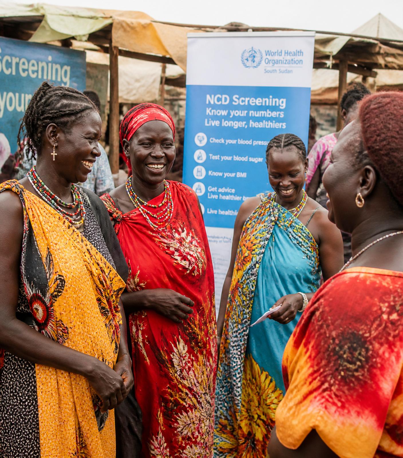 South Sudanese women gathering for a health education session